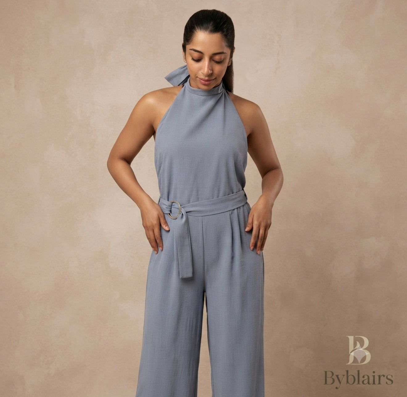 Jumpsuit Backless licht blauw met gesp zijkant