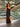 ADRIANA ONESHOULDER GALA JURK MET SPLIT ZWART