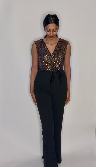 Jumpsuit stretch goud met glitters