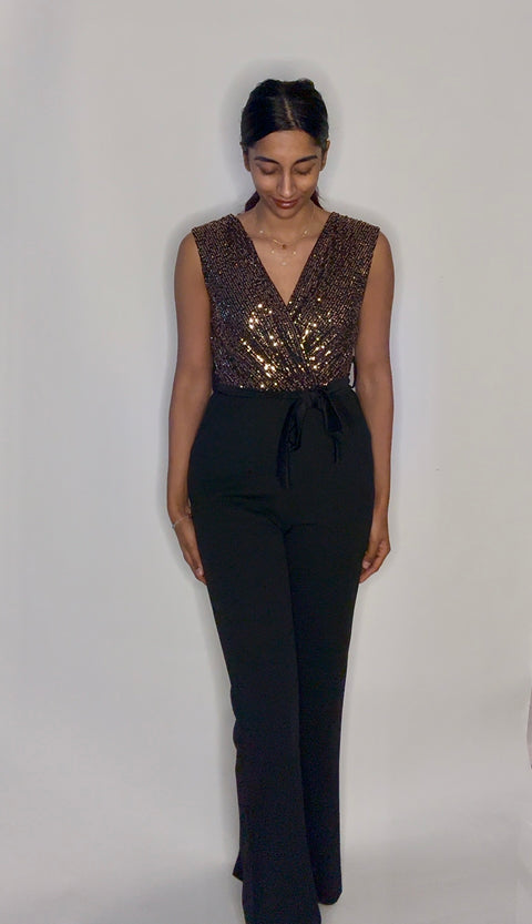 Jumpsuit stretch goud met glitters