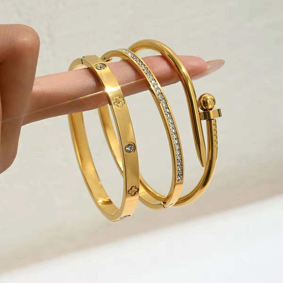 SS25 - Driedelig gouden armbanden