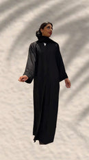 BLACK ABAYA MET BLACK PARELS DXB