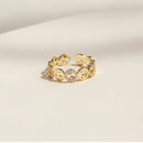 VERSTELBARE RING MET RONDJES GOUD
