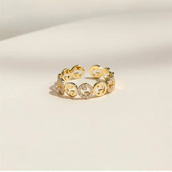 VERSTELBARE RING MET RONDJES GOUD