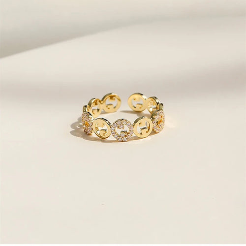 VERSTELBARE RING MET RONDJES GOUD