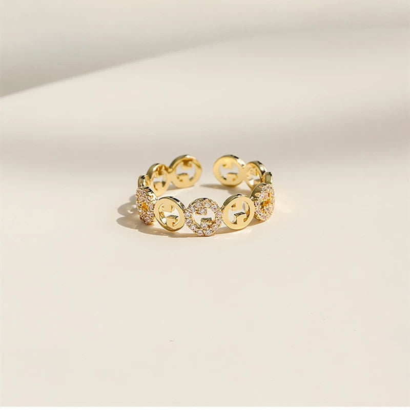 VERSTELBARE RING MET RONDJES GOUD