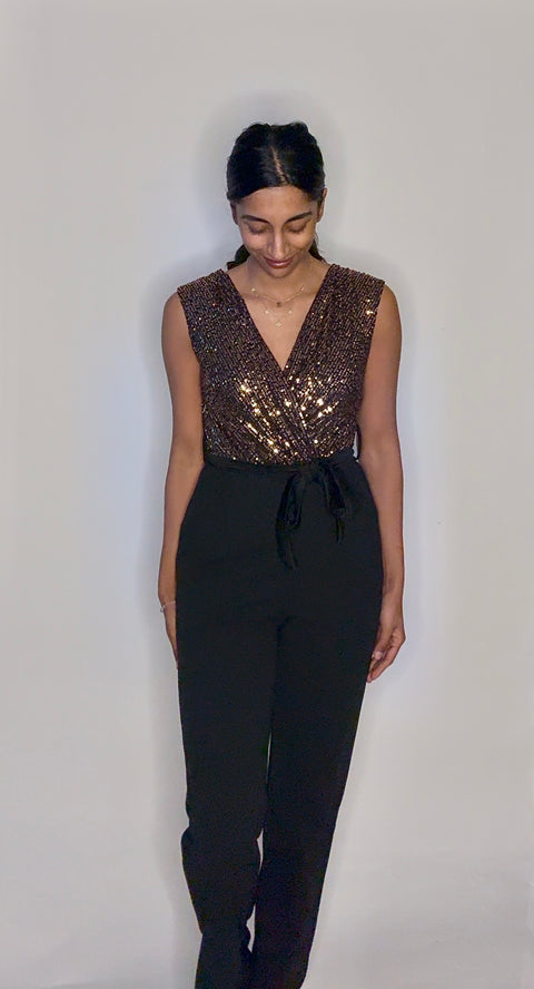 Jumpsuit stretch goud met glitters