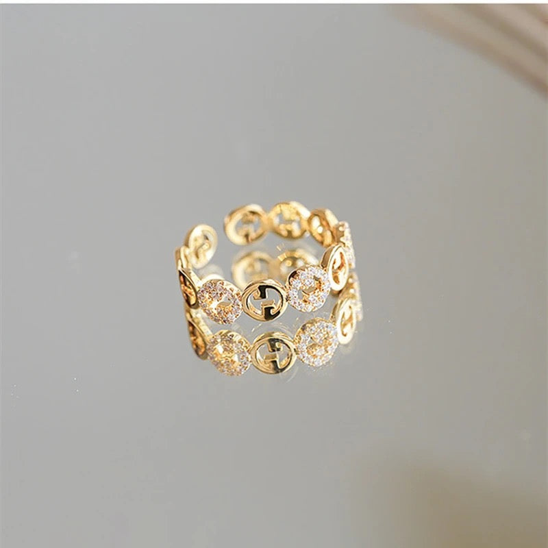 VERSTELBARE RING MET RONDJES GOUD