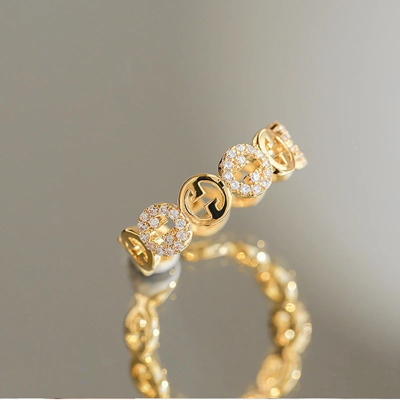 VERSTELBARE RING MET RONDJES GOUD