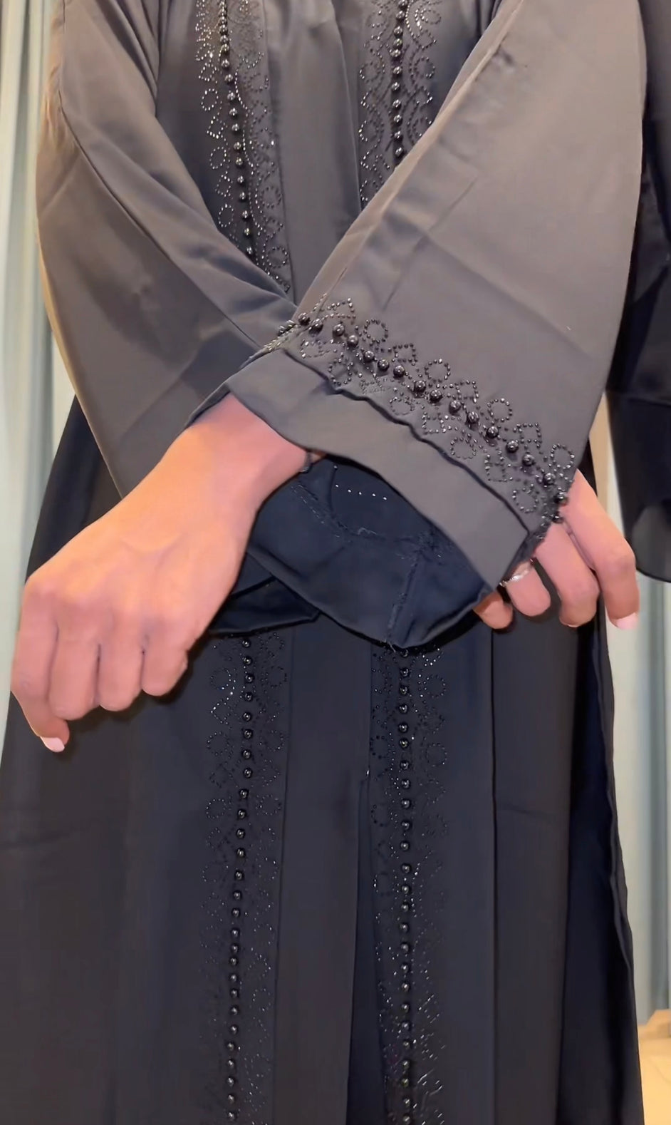 BLACK ABAYA MET BLACK PARELS DXB