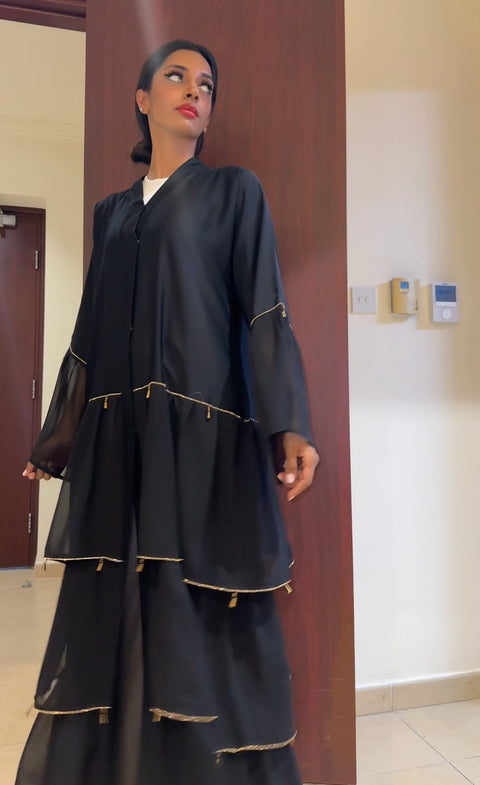 AUSVERKAUFT SCHWARZ GOLDENE KLEIDERBÜGEL ABAYA DXB