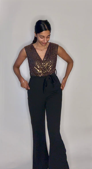 Jumpsuit stretch goud met glitters