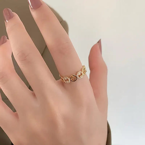 VERSTELBARE RING MET RONDJES GOUD