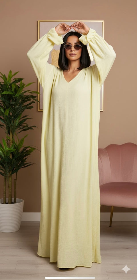 Inaya Lange jurk met zakken en franje mouwen - butter yellow