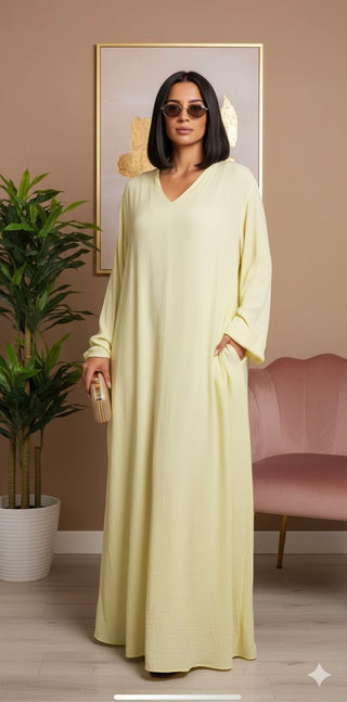 Inaya Lange jurk met zakken en franje mouwen - butter yellow