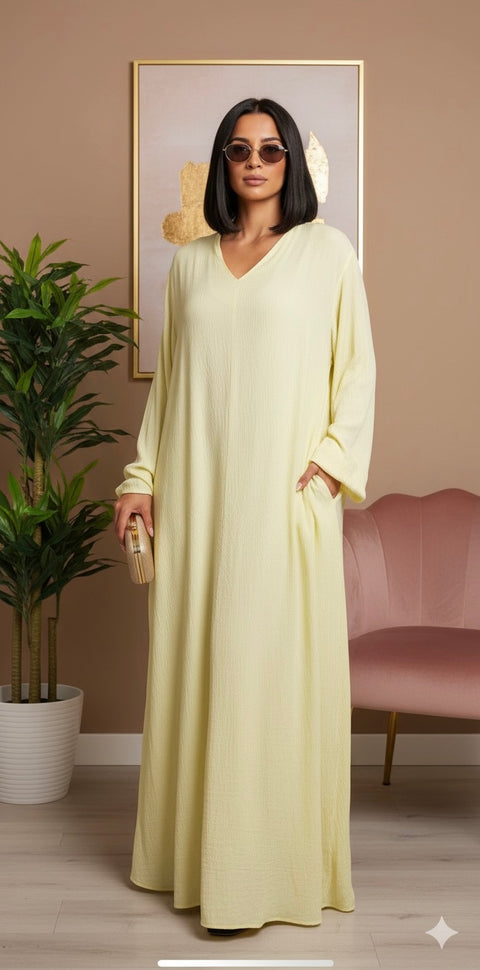 Inaya Lange jurk met zakken en franje mouwen - butter yellow