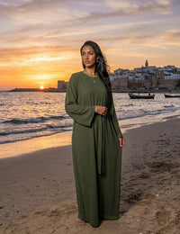 Glitter jurk met wijde mouwen en strik achterkant - groen
