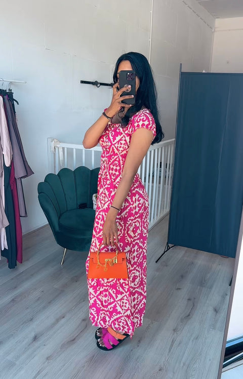 Rekbare lange jurk met printjes roze wit