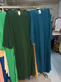 Manar petrol blauw en donker groen flora jurken