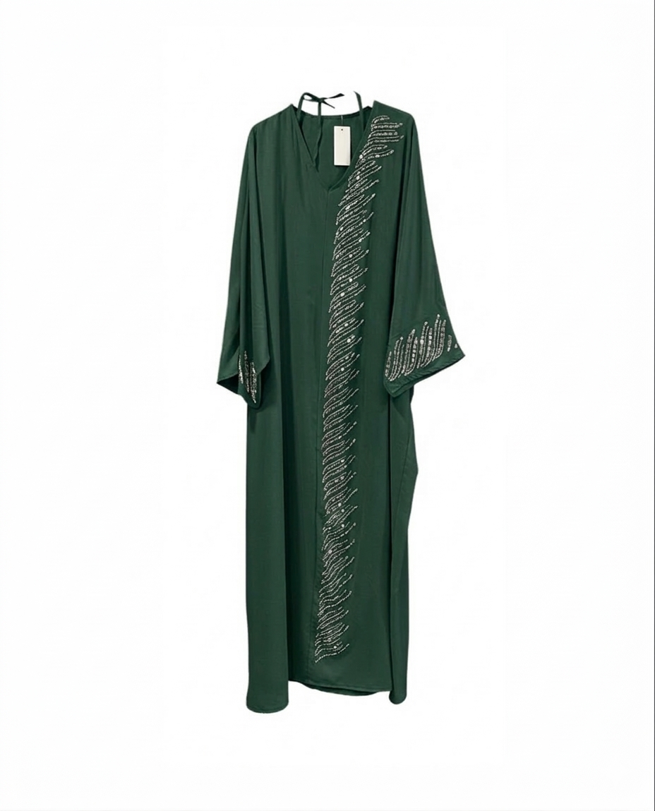 De "Midnight Shimmer" Abaya
- groen