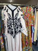 Silletje1 Abaya zwart met crème en rode print jurk