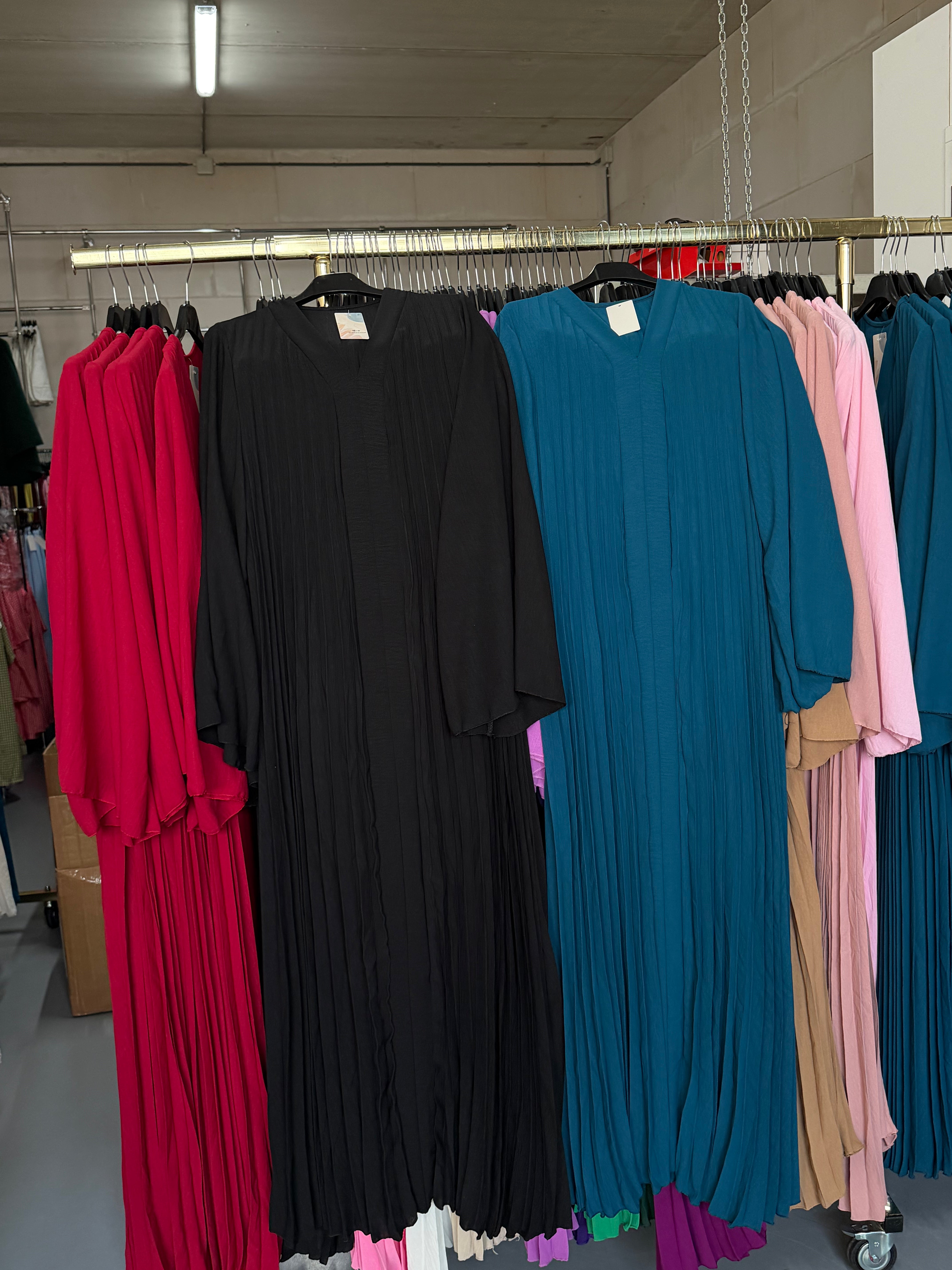 Rash petrol blauw en zwart flora jurken