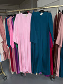 Yoss licht roze en petrol blauw flora jurken