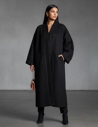 Oversized manteljas met zakken